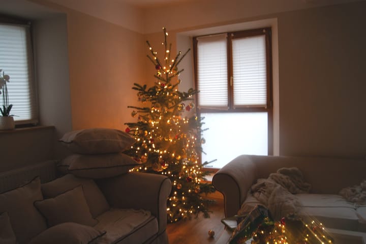 Christmas tree in a messy living room